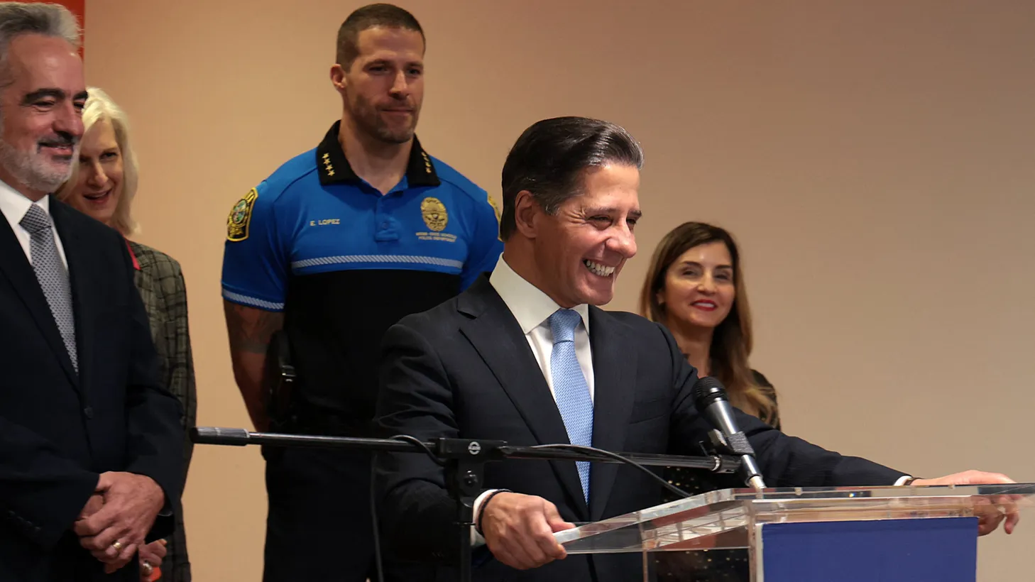Alberto Carvalho takes "a punt" and smiles after being asked which basketball team he will now support, the Miami Heat or the Los Angeles Lakers, on Dec. 9, 2021. The exiting Miami-Dade Public Schools leader announced his departure for Los Angeles as its new superintendent during a press conference at iPrep Academy in Miami.