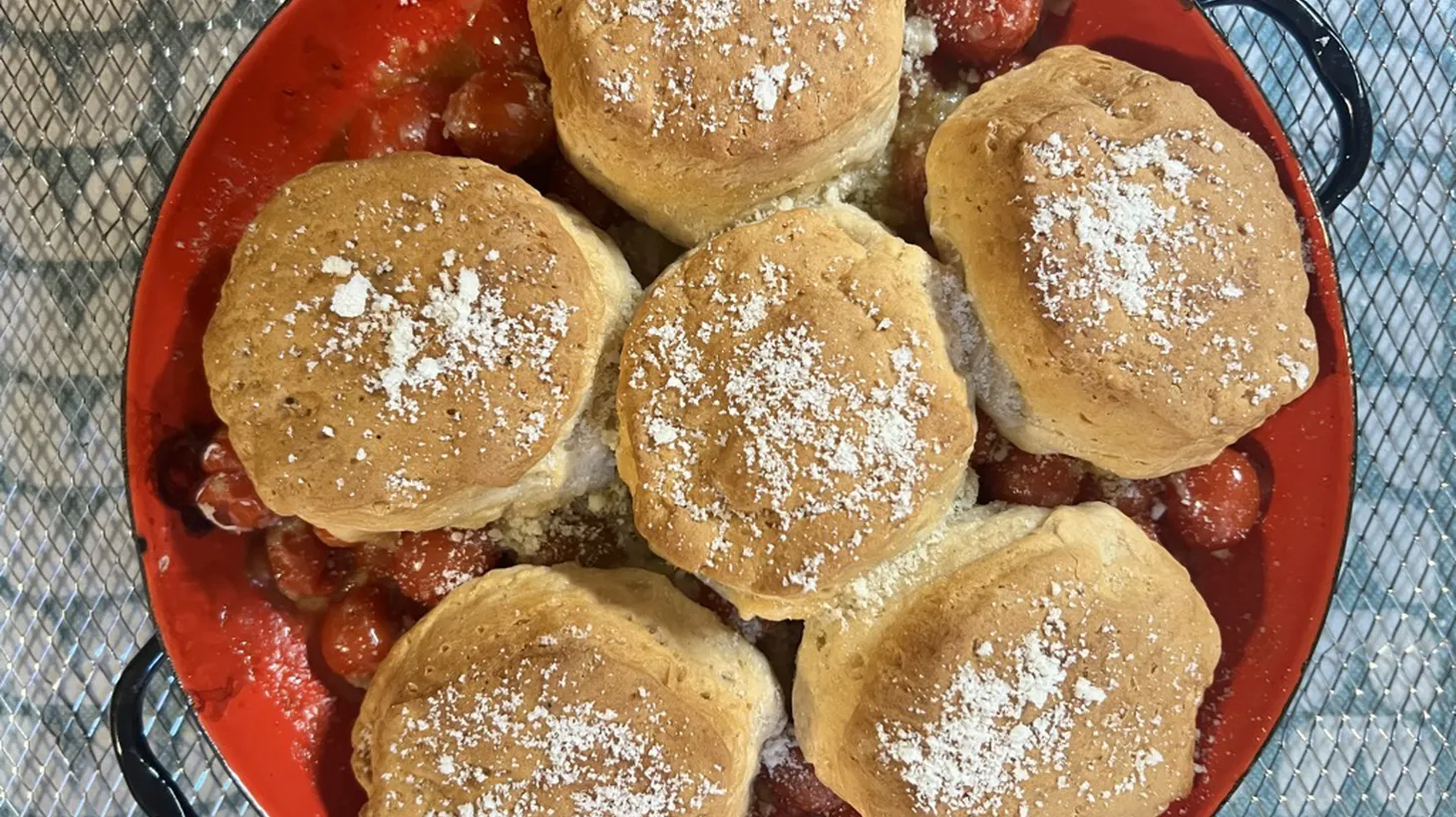 Making a cherry tomato cobbler is easy when you use refrigerated ready-to-bake biscuits.