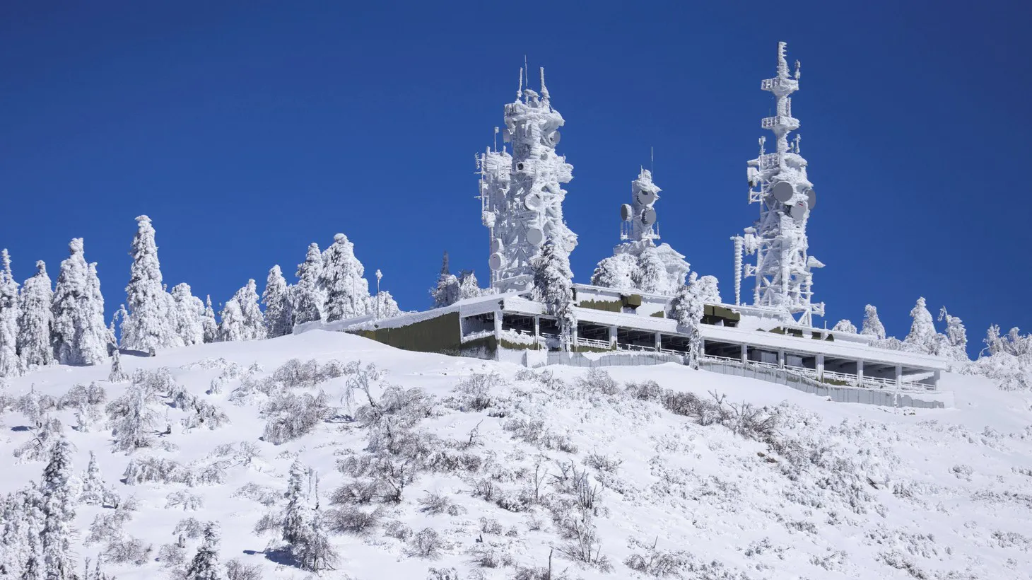 Ice covers communication towers as massive amounts of snow trap residents of mountain towns in San Bernardino County, Crestline, California, U.S. March 2, 2023.