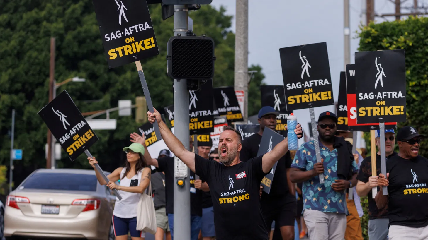 SAG-AFTRA actors and Writers Guild of America (WGA) writers walk the picket line in front of Paramount Studios in Los Angeles, California, U.S., July 17, 2023.