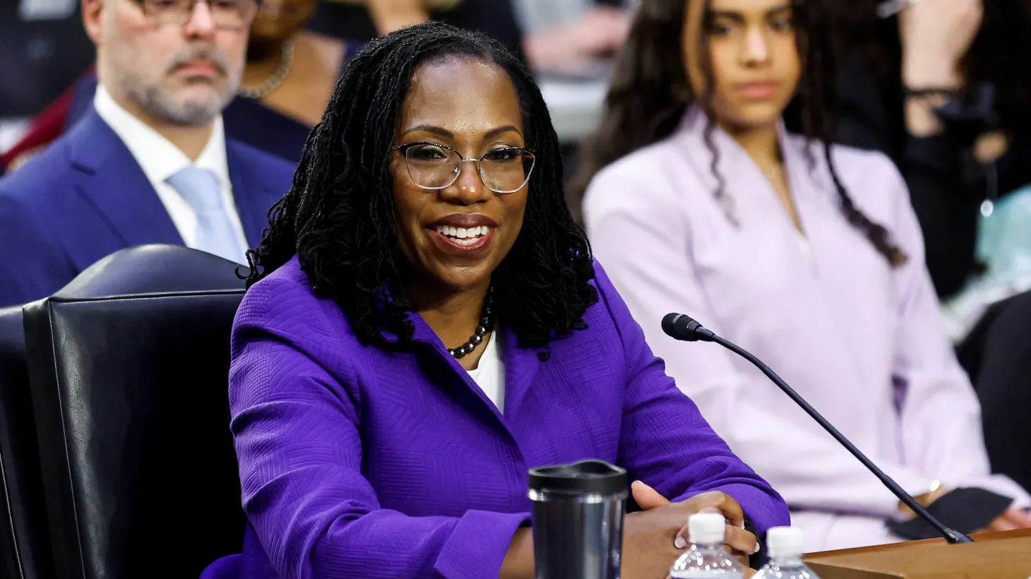 Judge Ketanji Brown Jackson smiles during her U.S. Senate Judiciary Committee confirmation hearing on her nomination to the U.S. Supreme Court, as her husband Patrick Jackson and her daughter Leila are seated behind her, on Capitol Hill in Washington, U.S., March 21, 2022.