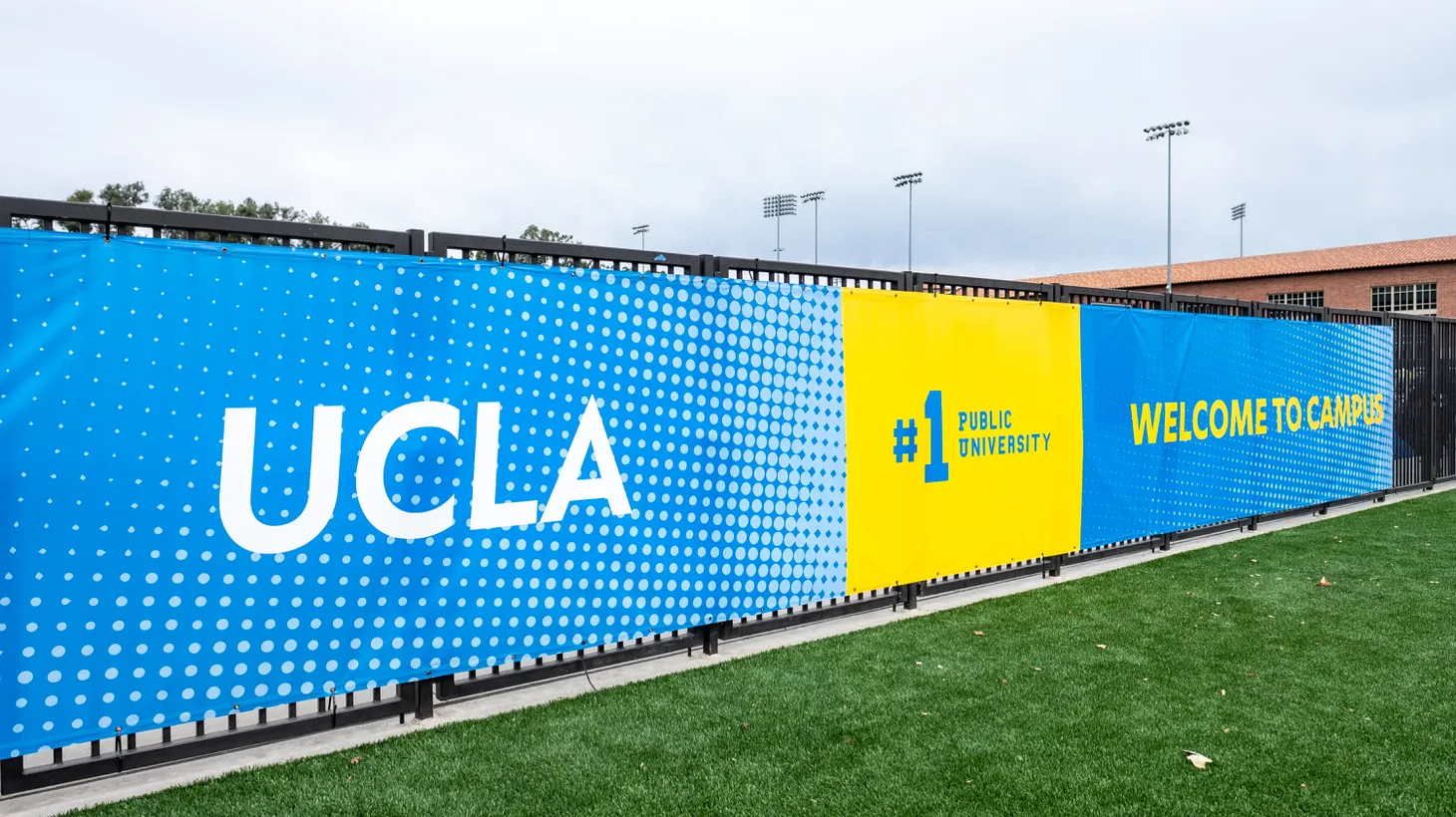 A UCLA sign welcomes people to campus, which it touts as the No. 1 public university.