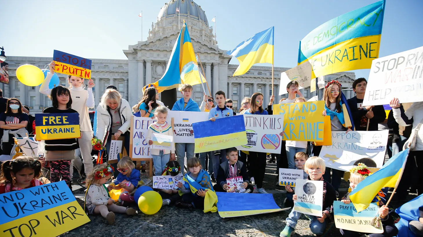 People participate in the pro-Ukraine rally outside San Francisco City Hall, February 27, 2022.