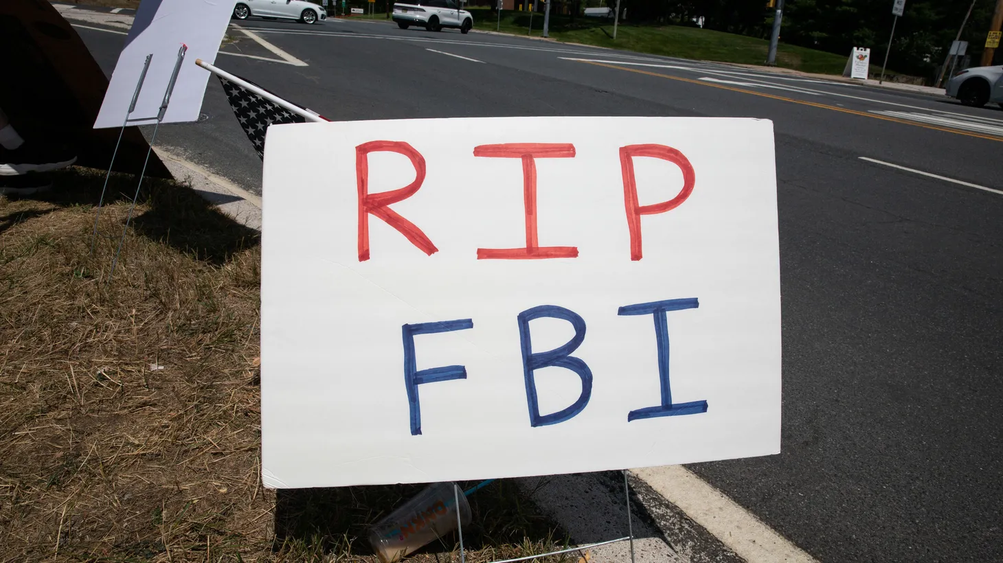 A sign says “RIP FBI” at a rally among Trump supporters near the Trump National Golf Club in Bedminster, New Jersey, August 14, 2022. This comes following the FBI's raid on former President Donald Trump's Mar-a-Lago home.