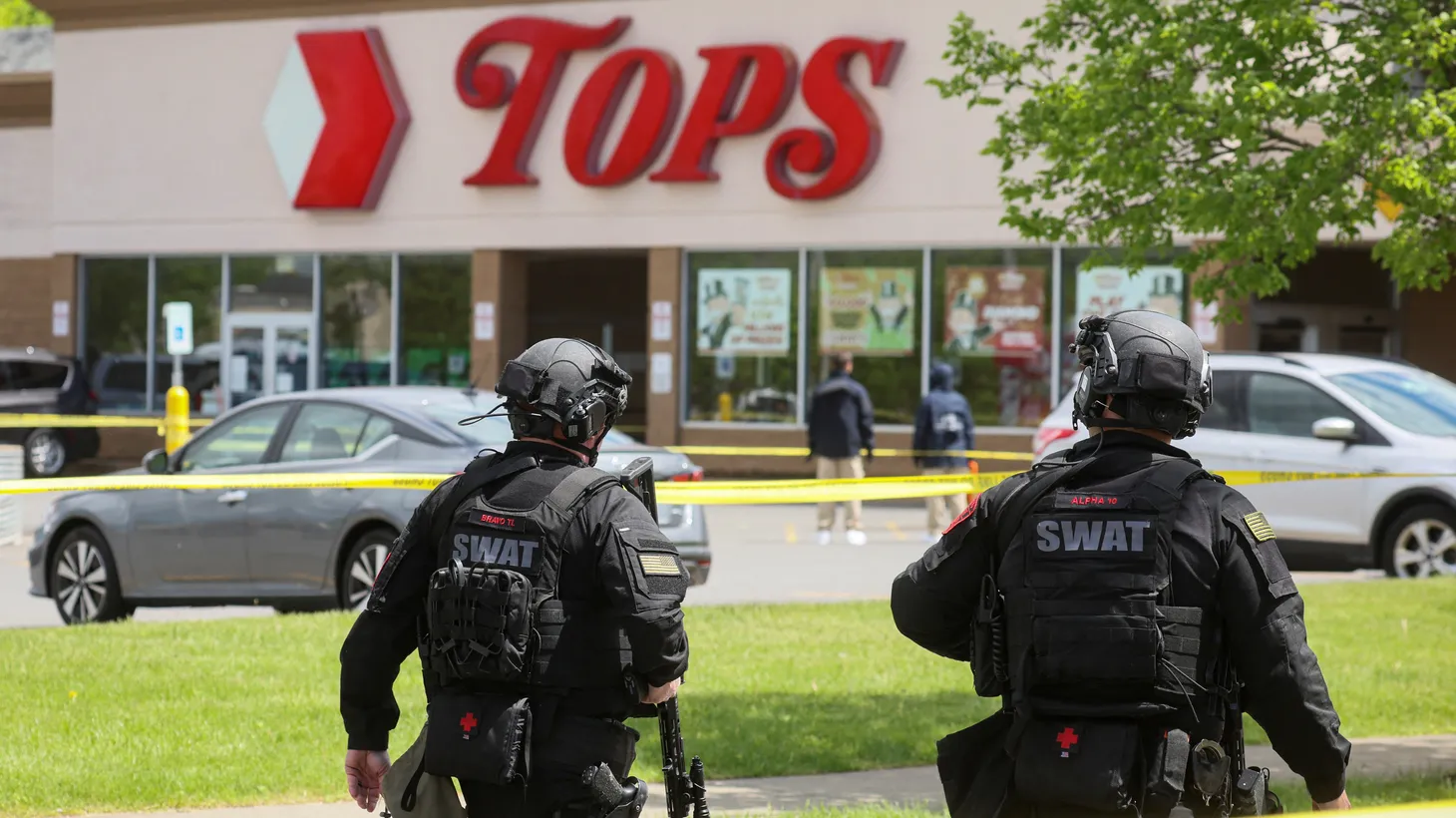 Members of the Buffalo police department work at the scene of a shooting at a Tops supermarket in Buffalo, New York, U.S. May 17, 2022.
