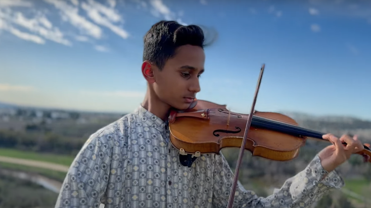 Yorba Linda’s Kaiden Surti is a 13-year-old violinist, tabla percussionist, and composer uniting his Indian and American roots through song.